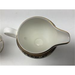 Wedgwood Cornucopia coffee service for six, comprising coffee pot, milk jug, twin handled covered sucrier, coffee cans and saucers