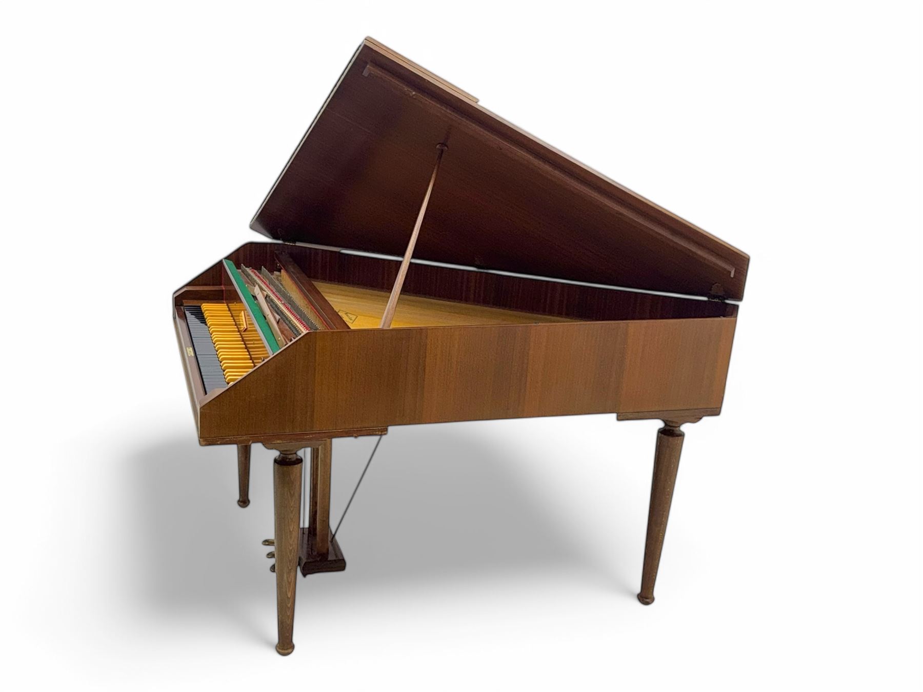 William de Blaise of London- mid 20th century Cembalo Traverso one manual Harpsichord in a teak case, with a five octave F1-f3 compass, two sets of strings and two rows of jacks, with three pedals and one hand stop, with one 8' and one 4', harp and piano to to 8', with a folding music desk and key fall, tuning key and tuning fork.
