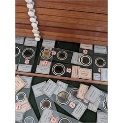 Victorian collector's specimen cabinet, containing a number of prepared microscope slides including miniature photographs, animal and human pathological, physiological and histological specimens and botanical specimens, mostly annotated in ink, the cabinet with glazed door, the drawers with bone handles and lined with green felt, owned by Dr Arthur Bristow, together with a picture of the doctor, cabinet H43cm