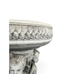 Cast stone cherub bird bath, circular removable top raised on three cherubs with ornate detailing