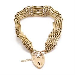 Early 20th century 10ct rose gold gate bracelet, with heart locket clasp stamped 9ct