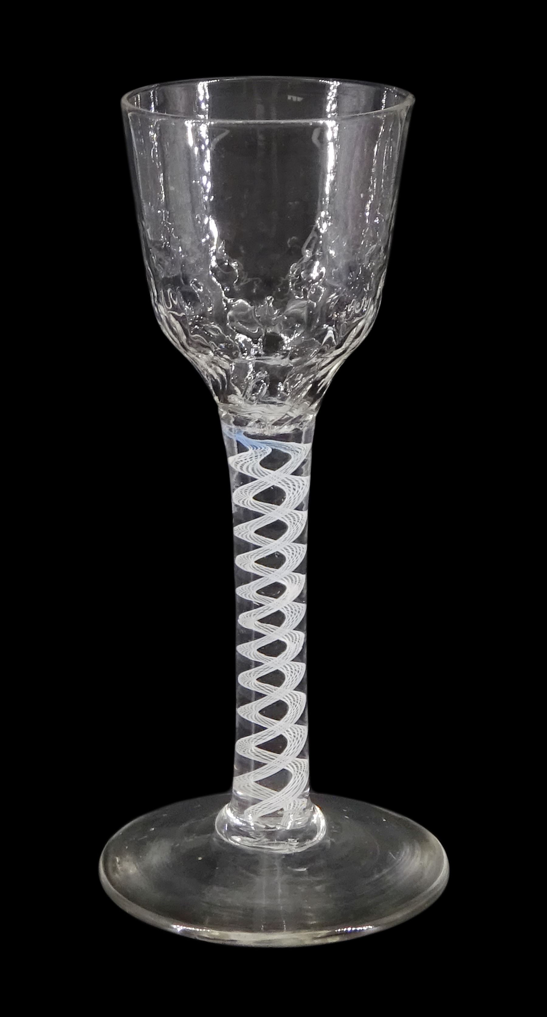 18th century drinking glass, the ogee part honeycomb moulded bowl upon a single series opaque twist stem and conical foot, H14.5cm