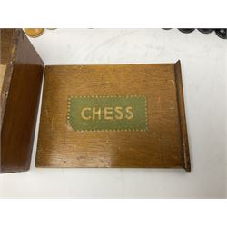 Thirty-two 20th century boxwood and ebonised wooden chess pieces, in wooden storage box, King H9.5cm