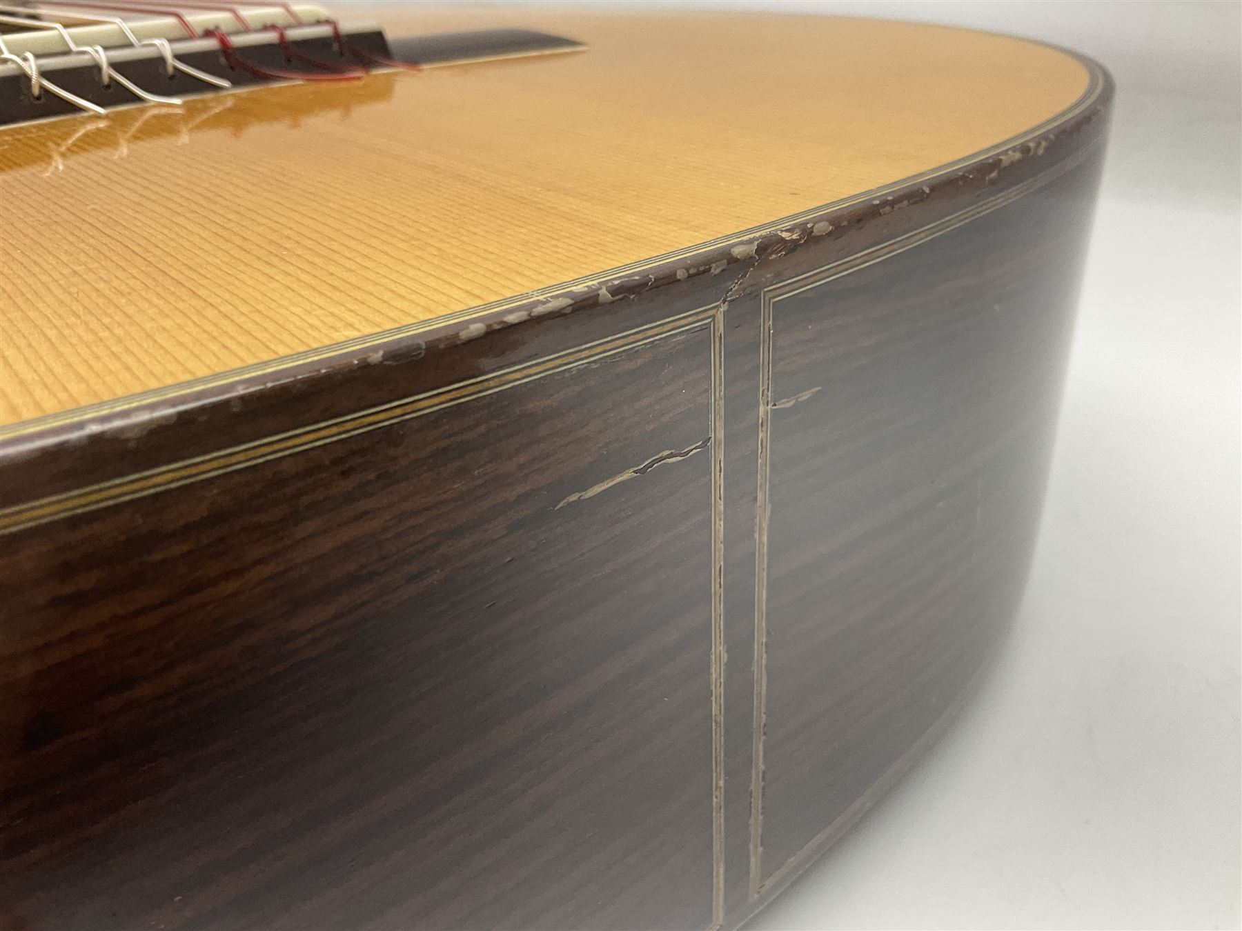 British hand made classical acoustic guitar by Huw Morgan with Indian rosewood back and sides and spruce top; bears label dated May 1998; L100cm; in Tribal Planet lightweight carrying case