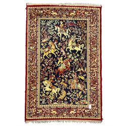  Persian indigo and crimson ground hunting rug, the filed decorated with hunters on horseback (205cm x 132cm); together with a small Afghan Bokhara rug (111cm x 79cm)