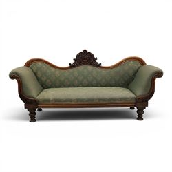 Victorian mahogany framed sofa, scroll arms with double camel back, green geometric upholstery, raised on turned supports