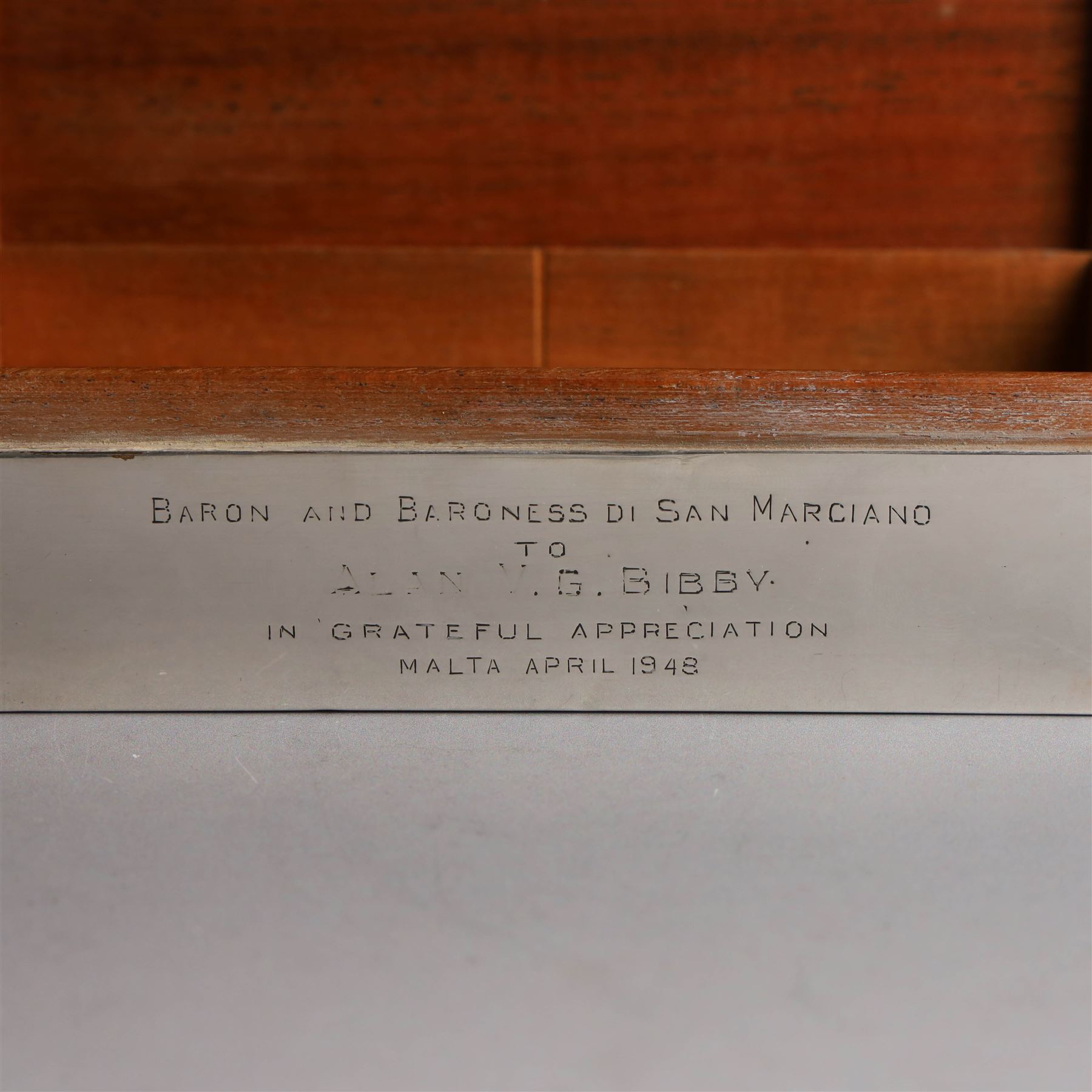 Mid 20th century silver mounted cigarette box, of rectangular form, with personal engraving to body reading 'Baron and Baroness Di San Marciano to Alan VG Bibby in grateful appreciation Malta April 1948, engraved with San Marciano family coat of arms to hinged cover, opening to reveal a softwood lined interior, hallmarked Adie Brothers Ltd, Birmingham 1946, H5cm, W16.5cm