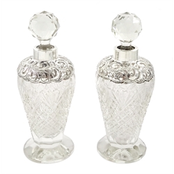 Pair of Edwardian silver mounted cut glass scent bottles by J H Worrall, Son & Co Ltd, London 1907, height 18cm 