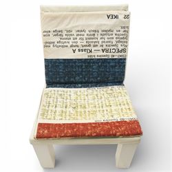 IKEA - ‘Selma’ chair designed by Front in 2009, the shaped wooden frame with white leather back and trim, fitted with cotton cushions with four interchangeable prints inspired by Swedish textile history