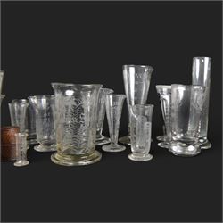Nineteen apothecary chemists glass measures, of various shapes and age 