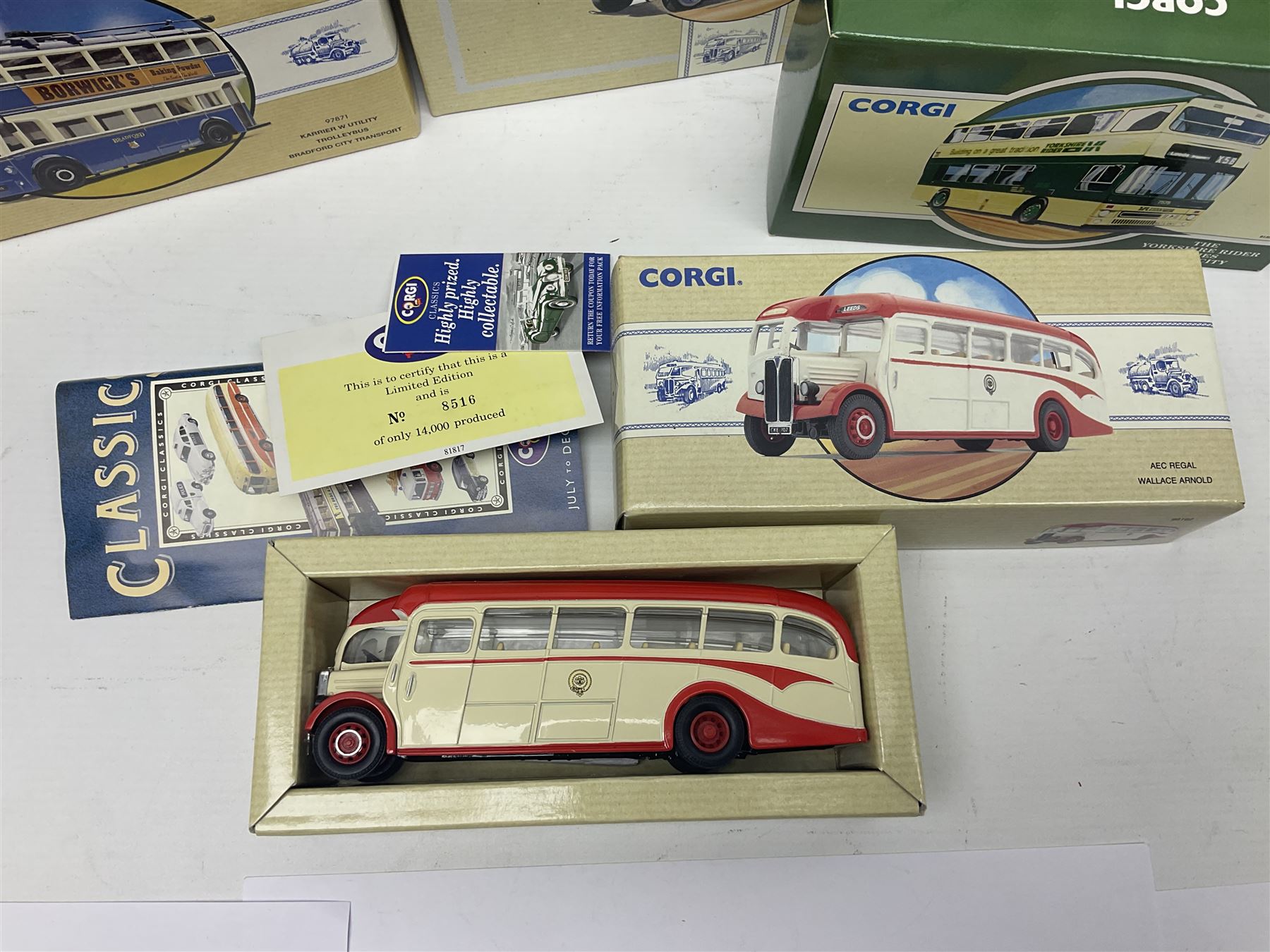 Corgi - twenty eight modern die-cast model coaches, buses and wagons to include Corgi Classics 35305, 96991, 97002, two 97108, 97208, 97267, 97335, 97871 and 98162; limited edition sets D949/26, 97107 and 97185; The Yorkshire Rider Series 91700, 91853, 91858 and 91862; all but one in original boxes or perspex display cases, most with certificates (27)
