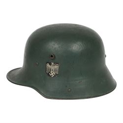 German double decal  M16 helmet with tricolour decal to the right and army eagle to the left, with leather lining and strap 