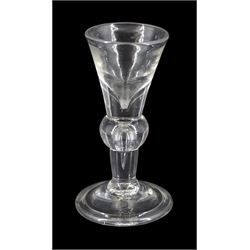 Early 18th century toastmasters glass, the deceptive funnel bowl upon a knopped stem with elongated tear and folded conical foot, H11cm