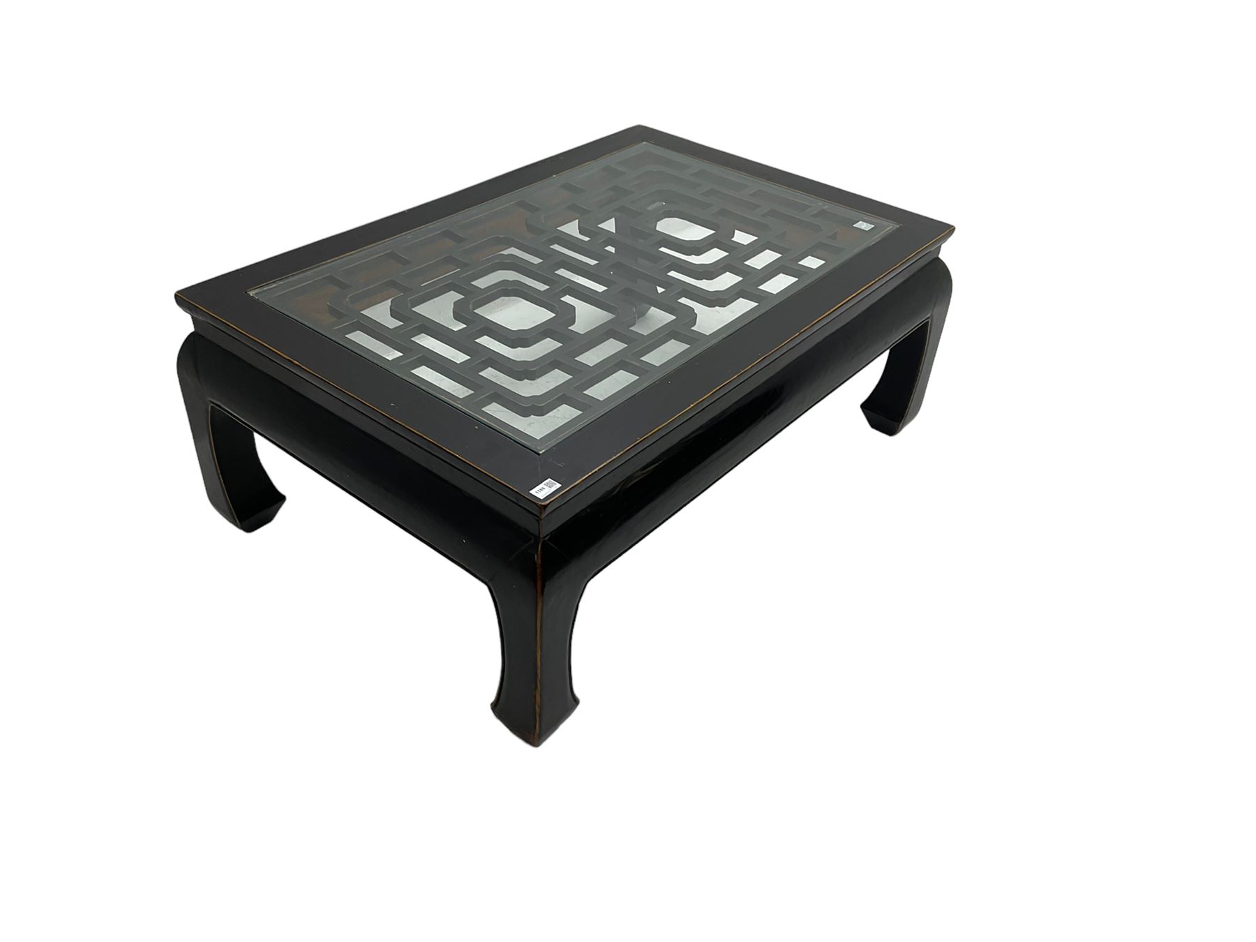 Chinese ebonised rectangular coffee table, inset glass top over pierced geometric fretwork, raised on shaped supports