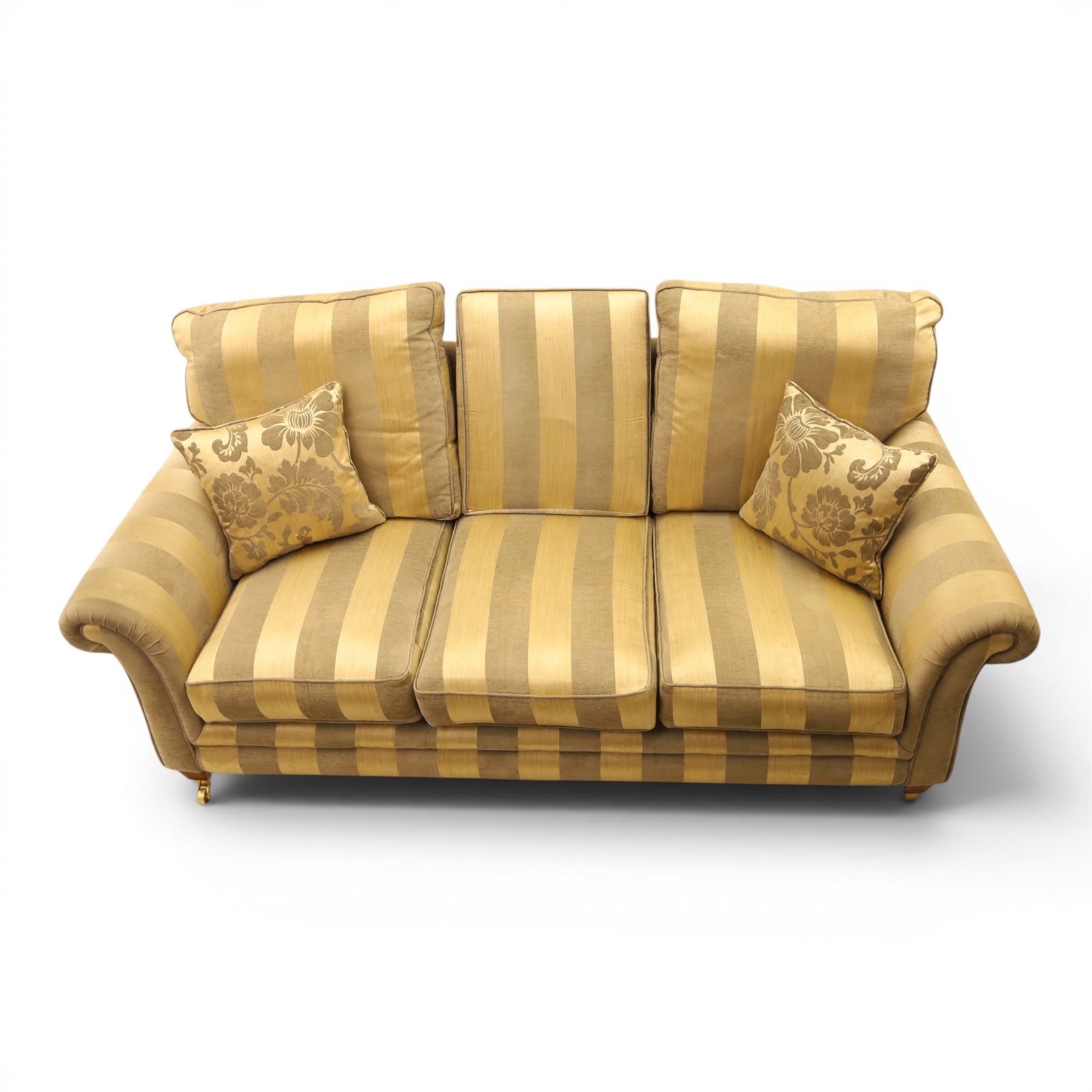 Alstons - 'Ixworth' three seat sofa, upholstered in striped fabric, with loose seat cushions and scrolled arms, front brass castors