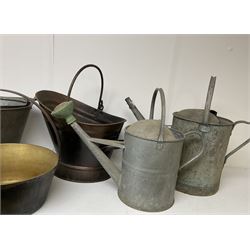 Two vintage galvanised watering cans, three galvanised buckets and a brass jam pan