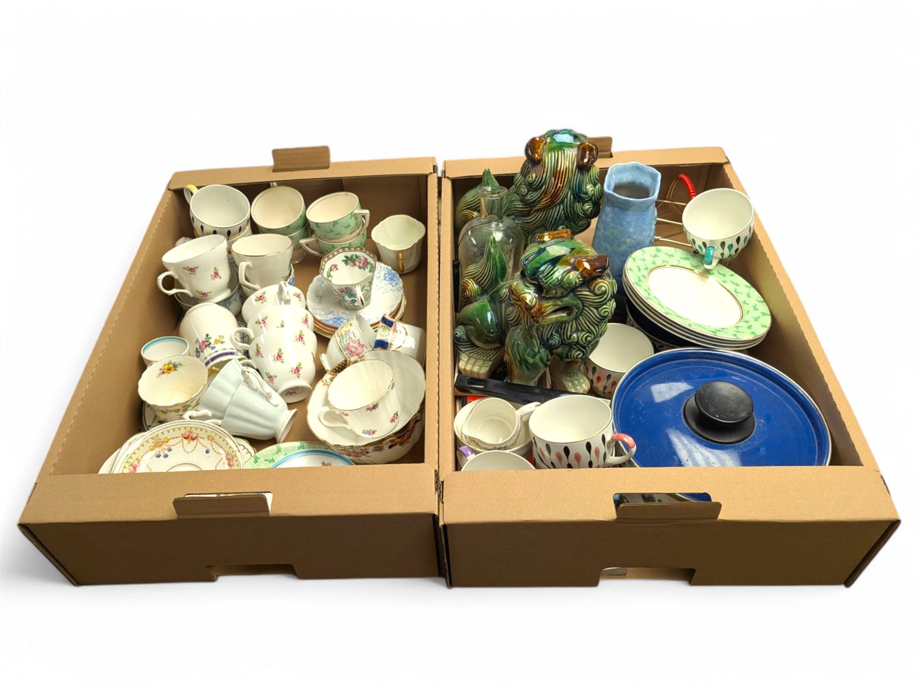 Pair of foo dogs, enamel pans and a collection of teacups, saucers and other ceramics