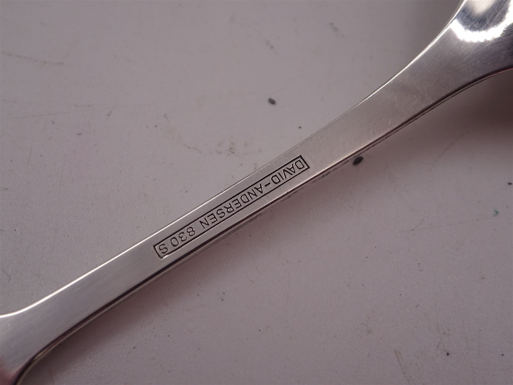 Mid 20th century Norwegian silver Christening spoon and fork set with openwork lattice detail to finials, both stamped David Anderson 830S verso, in original box, together with three silver-gilt enamel coffee spoons, the larger example with green guilloche enamel to bowl and handle, all by David Anderson, stamped D-A 925S Norway Sterling verso