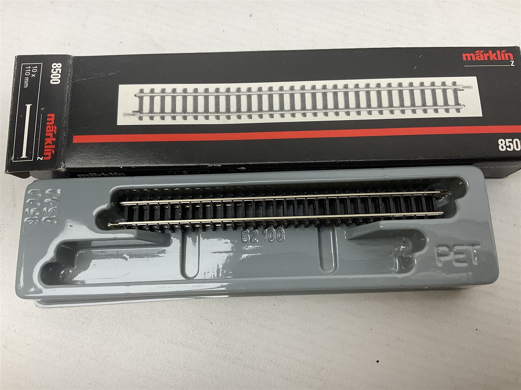 Marklin 'Z' gauge Mini-Club - Track Set-T1; part box No.8500 track; six goods wagons Nos.8610, 8611, 8622, 82271, 82351 & 82373; and a passenger coaches No.87335; all boxed (9)