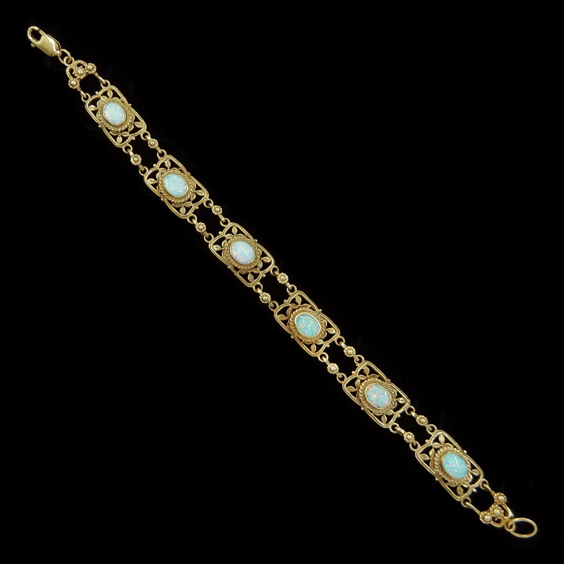 9ct gold fancy opal link bracelet, hallmarked