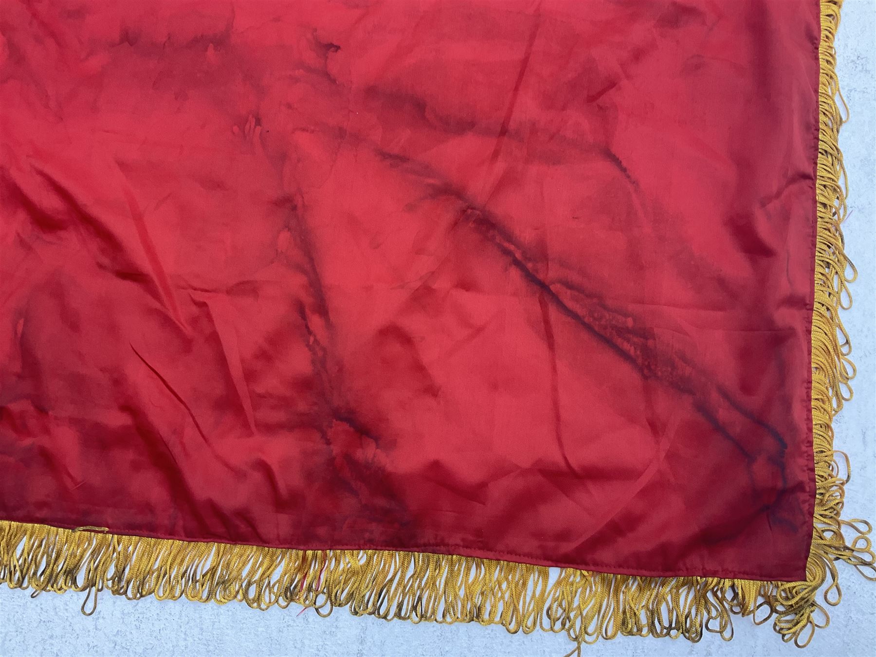 1960s North Vietnam banner embroidered in yellow thread on a red ground, roughly translates as 'Peoples Army of Viet Nam. Warriors of Viet Nam Determined To Keep The Country 1964' around a central military crest with the motto 'Warriors Keep The Country'; tassels to three sides 70 x 100cm