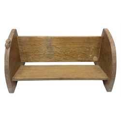 'Mouseman' oak book trough, curved end supports, carved with mouse signature, by Robert Thompson of Kilburn, 
