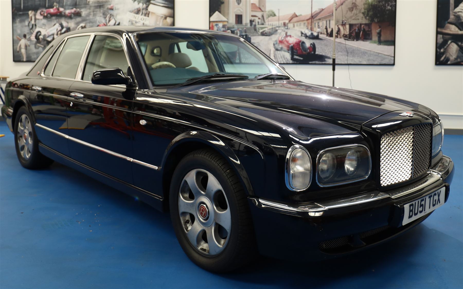 2001 Bentley Arnage Red Label Saloon

Registration: BU51 TGX
Engine: 6.75-litre turbocharged V8 petrol
Transmission: Automatic
Odometer reading: 39,942 miles
Colour: Black Sapphire metallic
Interior: Magnolia leather with burr walnut veneers
Previous owners: 3
V5C: Present
Service history: Good service records

An exceptional Bentley Arnage Red Label Saloon, finished in Black Sapphire metallic, a very dark blue, with a Magnolia leather interior, contrasting dark blue carpets and extensive burr walnut veneers. The car displays an odometer reading of approximately 39,942 miles.

The Arnage Red Label combined Bentley’s renowned 6.75-litre turbocharged V8 engine with automatic transmission, delivering effortless performance in a traditionally appointed luxury saloon. The model is distinguished by its imposing proportions, characteristic Bentley radiator grille and finely crafted interior.

Presented in excellent condition throughout, the bodywork and metallic paint finish appear particularly well preserved, complemented by clean brightwork and the correct Bentley alloy wheels. The engine bay is also notably well detailed.

The interior presents exceptionally well, retaining its Magnolia leather upholstery, polished burr walnut veneers, original factory instrumentation and switchgear. The leather displays only light creasing consistent with careful use.

The car has had three previous owners and is accompanied by good service records.

Features

• 6.75-litre turbocharged V8 petrol engine
• Automatic transmission
• Black Sapphire metallic paintwork
• Magnolia leather interior
• Contrasting dark blue carpets
• Burr walnut veneers
• Electrically adjustable front seats
• Air conditioning
• Factory instrumentation and switchgear
• Bentley alloy wheels
• Right-hand drive
• Odometer reading of approximately 39,942 miles
• Three previous owners
• Good service records
• V5C present

This vehicle forms part of the Estate of the Late John Sills and is offered for sale by the Executors, confirming a genuine reason for sale.