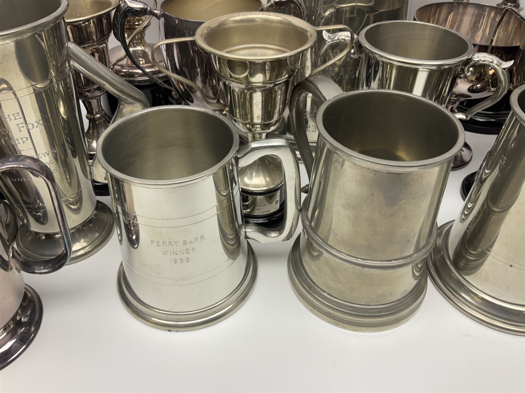 Collection of pewter and silver-plated trophy cups and presentation tankards, largest H28cm
