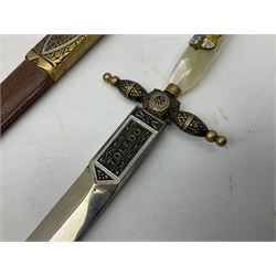 Malayan Kris dagger, the 31.5cm double edged straight heavy damascus blade with copper ferrule; carved hardwood grip; in large wooden throated scabbard with floral decorated white metal covering L47.5cm overall; a kris blade with adapted antler grip; and five various small daggers/letter openers (7)