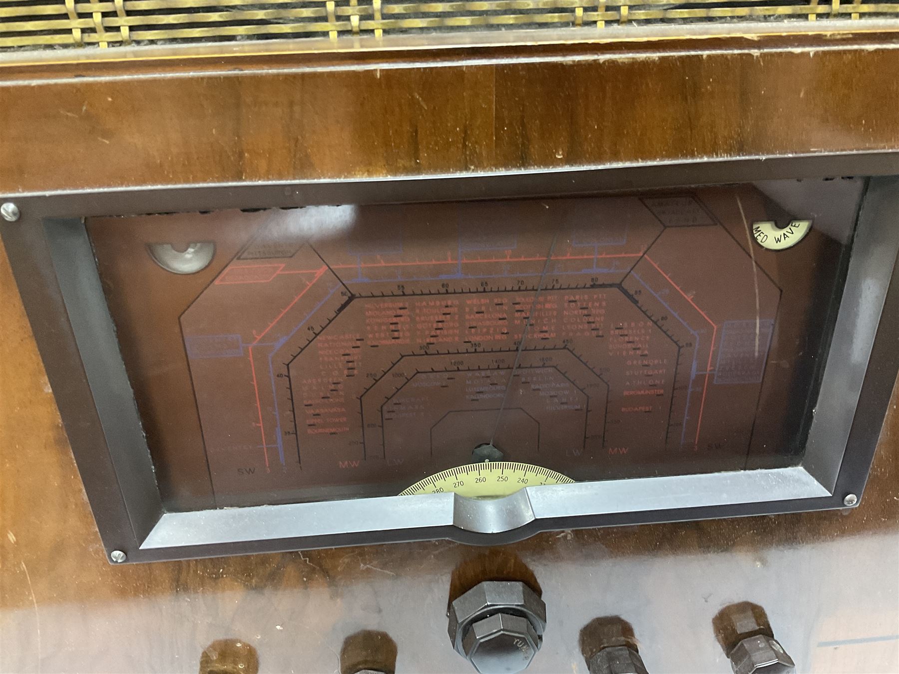 1930s Marconi Type 561 valve radio, in shaped Art Deco case with woven brass overlaid speaker, circa 1937, H58cm W50cm