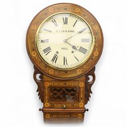 Lea & Son of Hull-American 8-day inlaid mahogany wall clock, with a curved base and carved ears flanking a glazed case door with open fretwork, 12” painted dial with Roman numerals, minute track and spade hands, spring driven movement with a countwheel strike, striking the hours on a bell. With pendulum.
