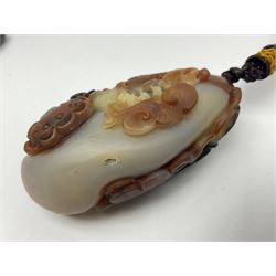 Chinese hardstone carving of a fish amongst coral, with platted rope handle, together with other hardstone and soft stone carvings  