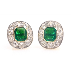  Pair of 18ct gold bright green emerald and diamond rub-over cluster ear-rings, by Richard Ogden each emerald 8mm x 7mm diamonds approx 1.4 carat   