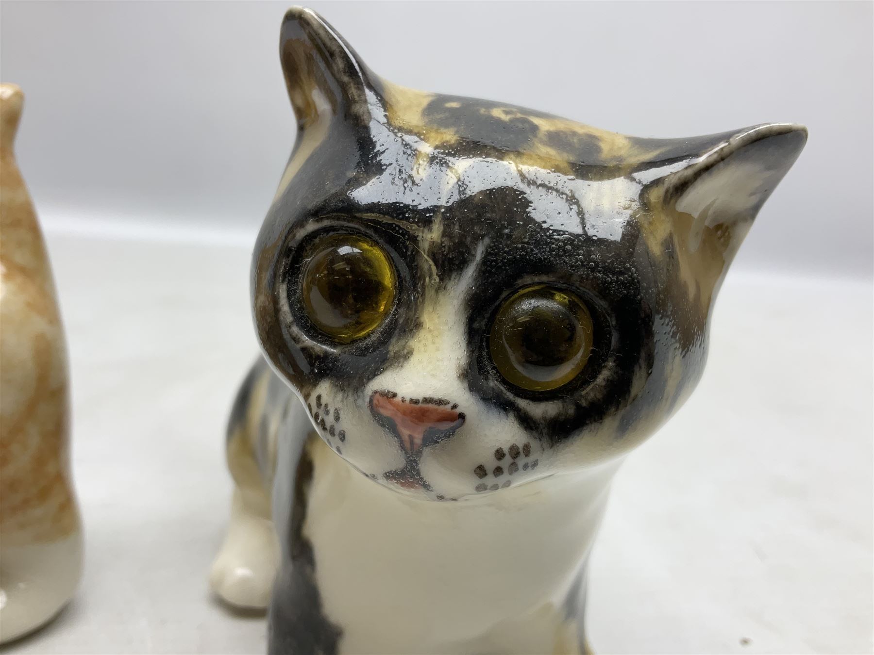 Two Winstanley figures of kittens, comprising tabby cat no 2 and ginger cat no 1, both with inset eyes and painted marks beneath, tallest H11cm
