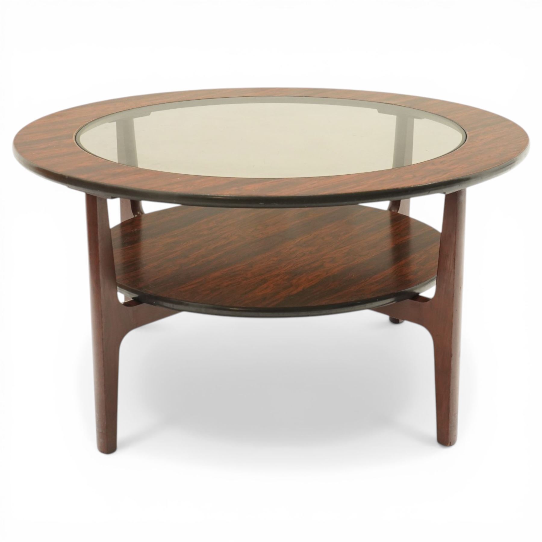 Mid 20th century Greaves & Thomas simulated rosewood circular coffee table, inset glass top with circular undertier on four tapering legs