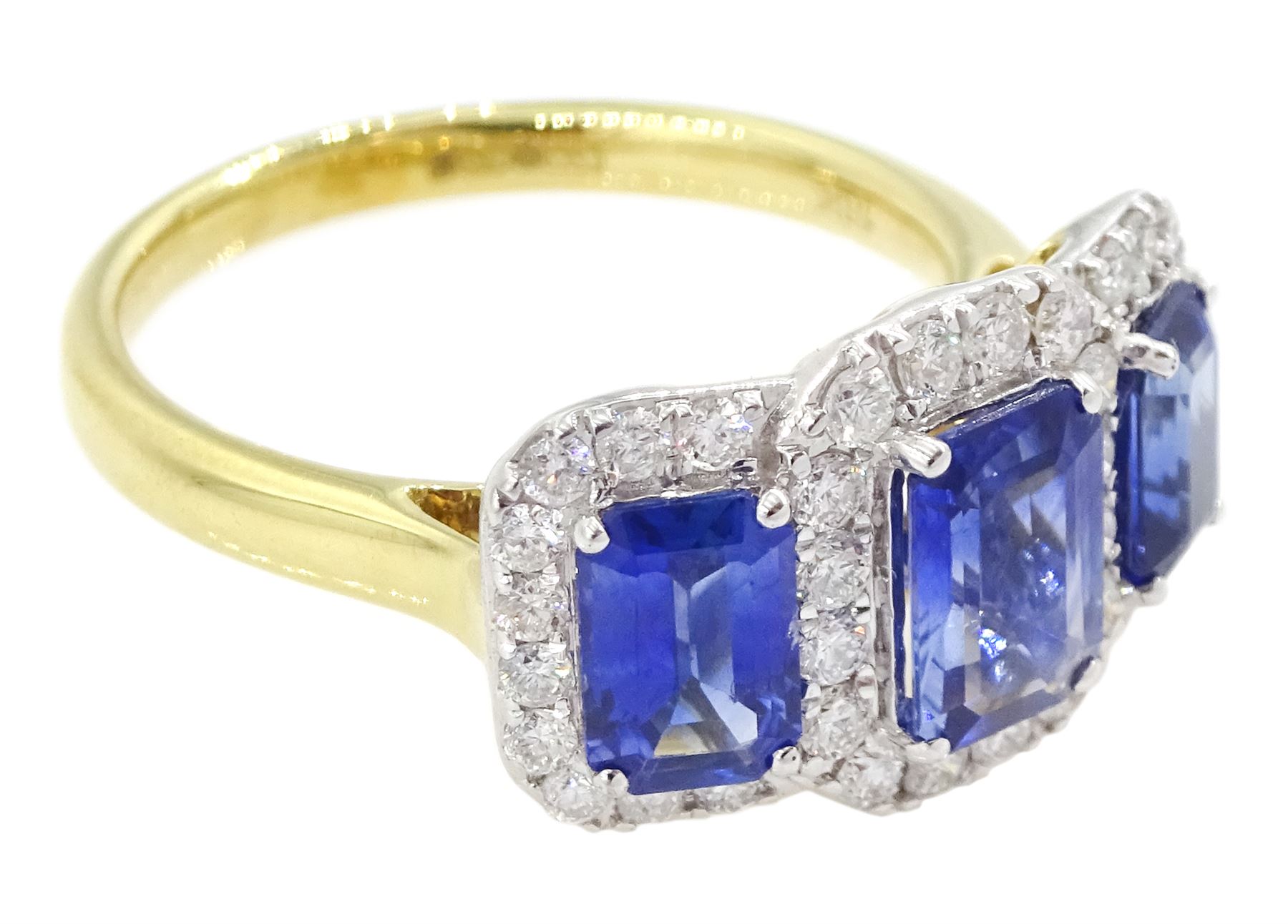 18ct gold sapphire and diamond cluster ring, three emerald cut sapphires, with round brilliant cut diamond surround, hallmarked, total sapphire weight approx 2.25 carat, total diamond weight approx 0.50 carat