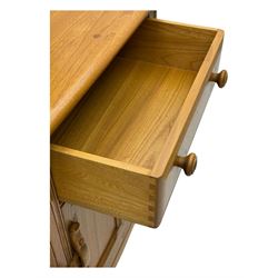 Ercol - golden dawn light elm dresser, plate rack above two drawers and two cupboard doors with sliding wooden lock mechanism 