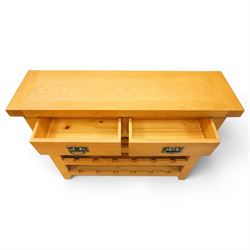 Contemporary solid oak wine rack console table, rectangular top fitted with two drawers, over a three-tier wine rack for twenty-four bottles, on square canted feet