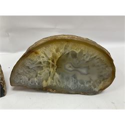 Four polished blue agate geodes, largest H10cm, L18cm