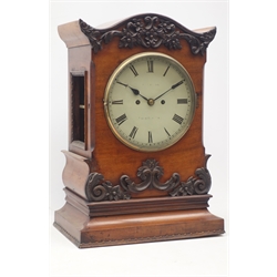  Large Victorian mantle clock, serpentine pediment with floral carved mounts, circular Roman dial signed indistinctly 'Reid and Sons Newcastle-upon-Tyne', twin fusee movement striking the hours on bell, H50cm  