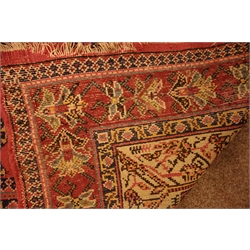  Persian pink ground rug, decorated with repeating Boteh motif, 274cm x 205cm  