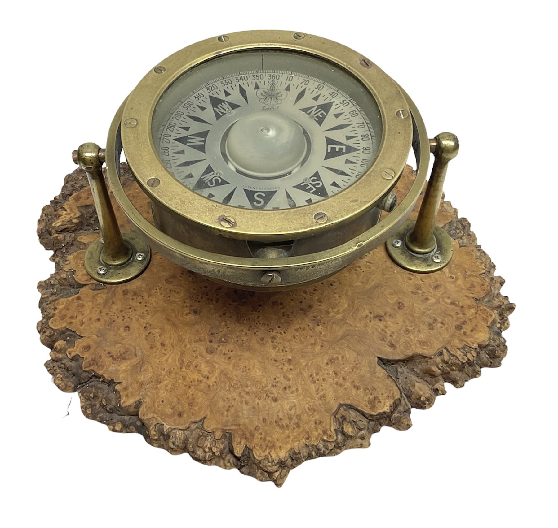 Sestrel brass cased ships gimbal mounted compass, fitted on a burrwood slab, serial no.5532, pat.no.586665 D19cm