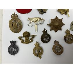 Twenty-six cap badges for Yeomanry and various guards including Fife & Forfar, Lothian and Border Horse, Leicestershire, Northamptonshire, Queens Own, Coldstream, Grenadier, Machine Gun Regiment, Life Guards etc (26)