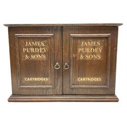 Oak table top cabinet, the double hinged doors detailed James Purdey and Sons, H28.5cm, L41.5cm