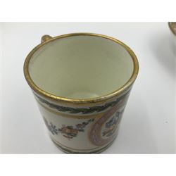 Sèvres soft paste porcelain coffee can and saucer with date code for 1780, painted with pink oval panels bordering bouquets of flowers, united by swags of flowers tied with purple ribbons, within laurel leaf borders, interlaced LL monogram enclosing date letters CC above painters marks for Nicquet, coffee can H7.5cm, saucer D15cm