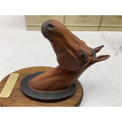 Beswick set of horse head wall plaques 'Champions all', comprising Arkle no.2700, The Minstrel no.2701, Red Rum no.2702, Troy no.2699, all with original boxes