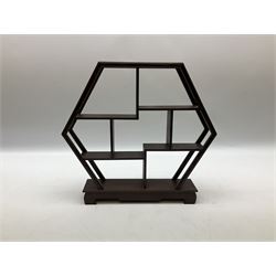 Hexagonal multi tiered table top display stand, H28.5cm and a similar circular stand, H30cm (2)