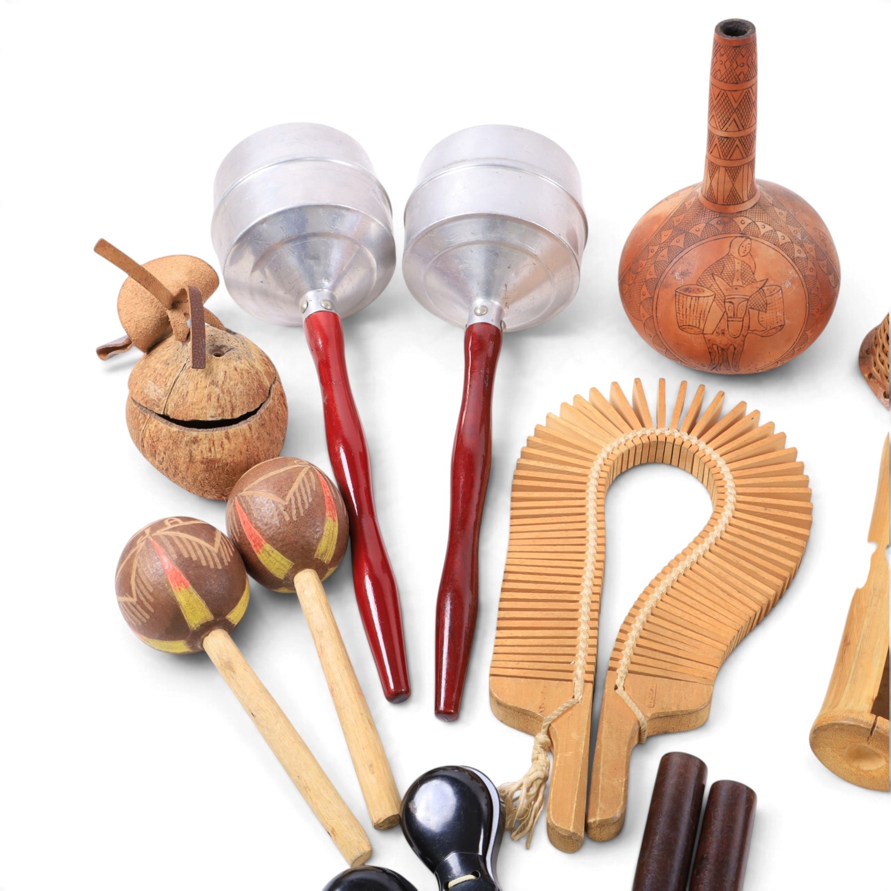 Collection of percussion instruments, including pair of metal maracas, cabasa, shekere, gourd maraca, guiro, wooden maracas, plastic castanets, etc