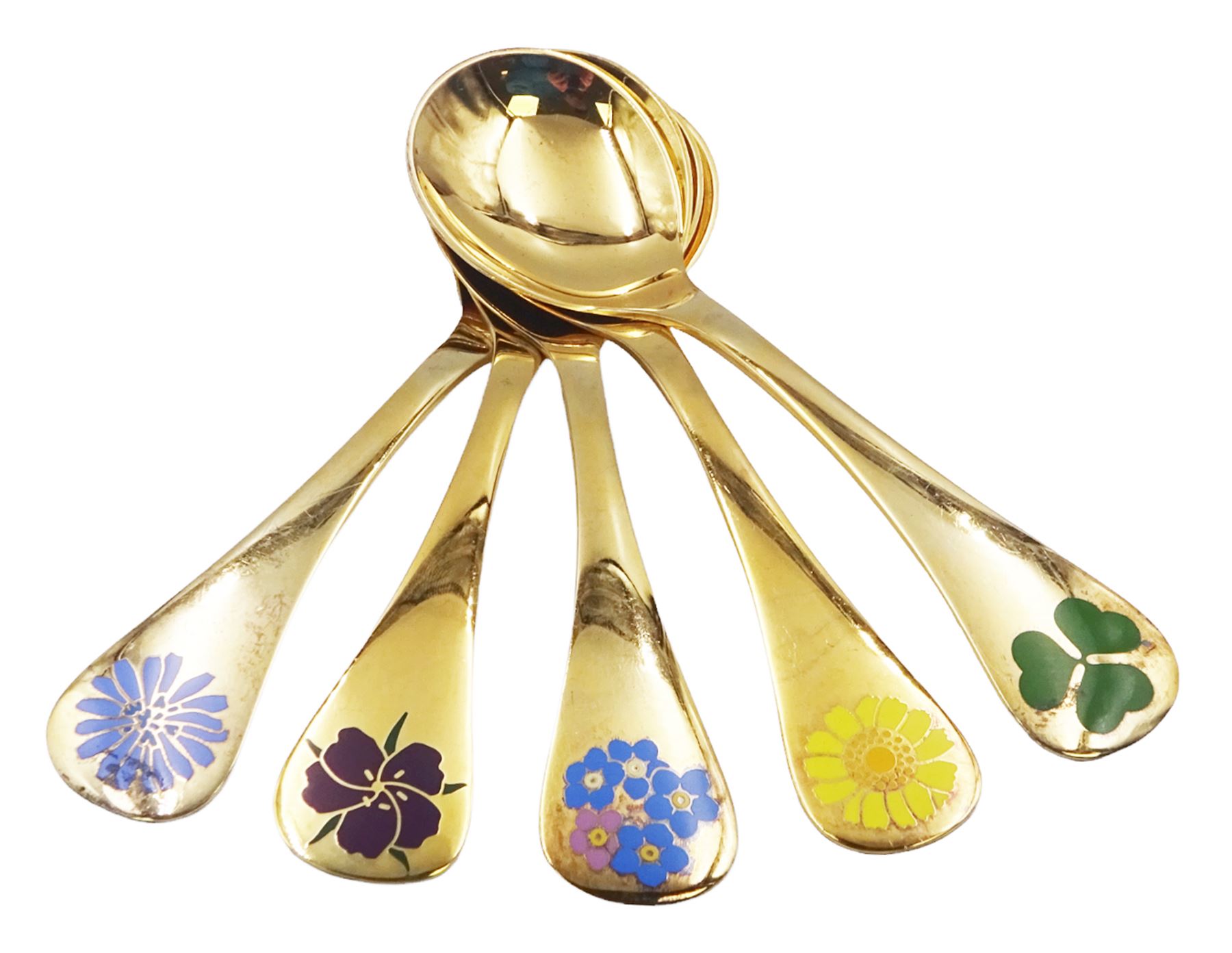 Five Danish silver-gilt year spoons by Georg Jensen, each decorated with different floral motif including sunflower, forget-me-not and shamrock, dated between 1973 and 1983, each impressed on underside RA AB, Sterling Denmark, and marked for Georg Jensen, approximate gross weight 7.3ozt (227 grams)