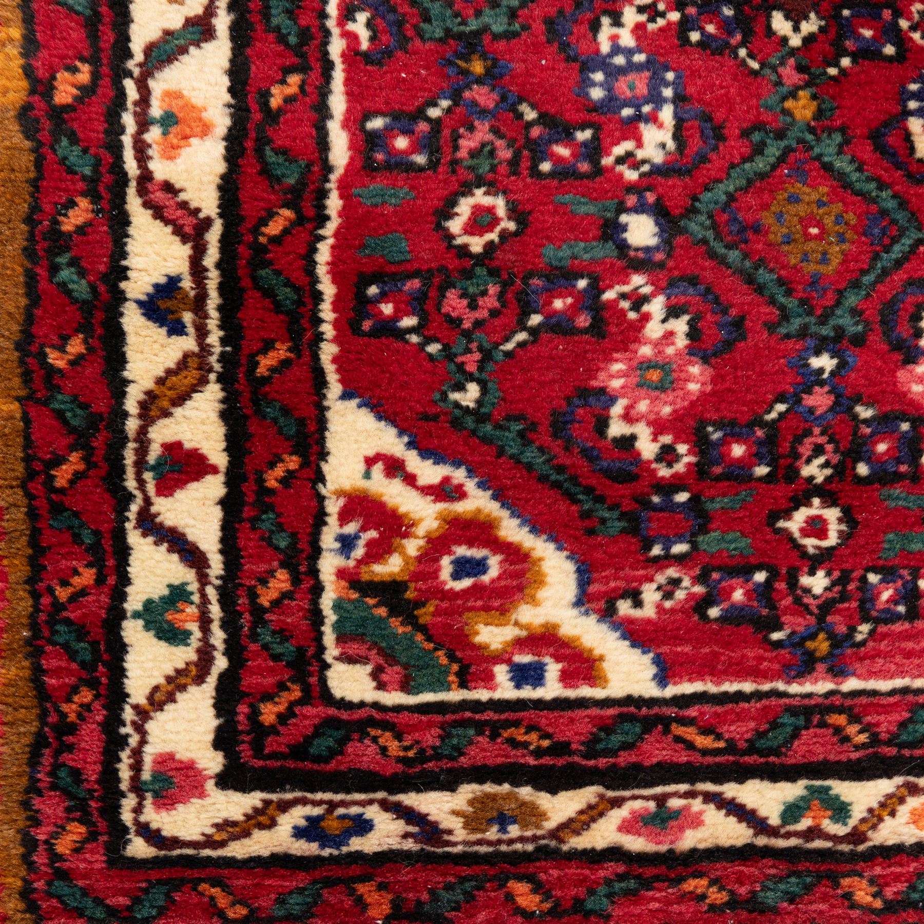 North west Persian hand-knotted Malayer runner, vibrant rose field with an all-over lattice design of lozenges and stylised floral motifs, ivory spandrels within a zig-zag main border flanked by multiple guard stripes 